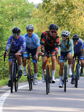 Lade das Bild in den Galerie-Viewer, Gruppe mit Rennradklamotten im bunten Hawaii Blumen Style