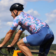 Lade das Bild in den Galerie-Viewer, Mann mit blau rosa buntes Radtrikot und Radhose Hawaii Style

